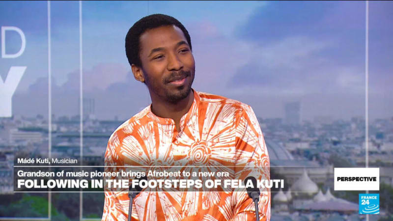 Music producers collaborating in recording studio at Mavin Records headquarters in Lagos, Nigeria