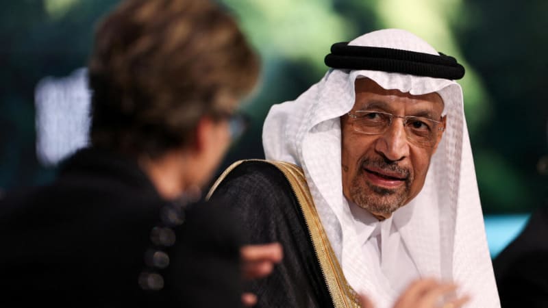 Syrian and Saudi Arabian officials shake hands at investment agreement signing ceremony in Damascus