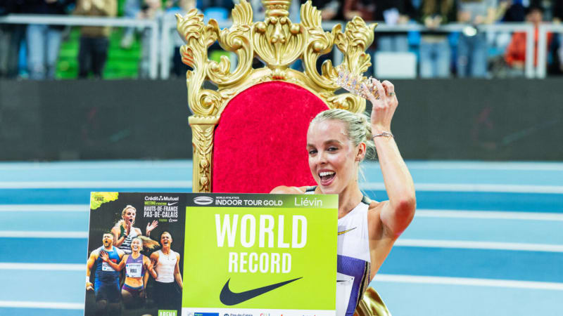 British runner Keely Hodgkinson celebrating on indoor track after breaking world record