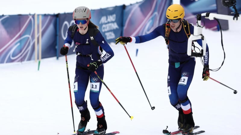 Emily Harrop and Thibault Anselmet competing in ski mountaineering mixed relay at 2026 Olympics