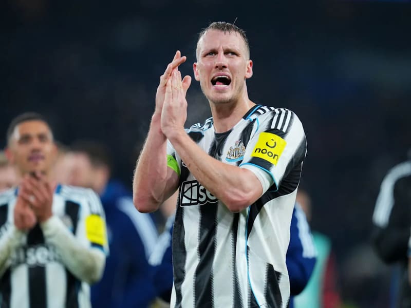 Newcastle United captain Dan Burn playing against PSG in Champions League match at Parc des Princes