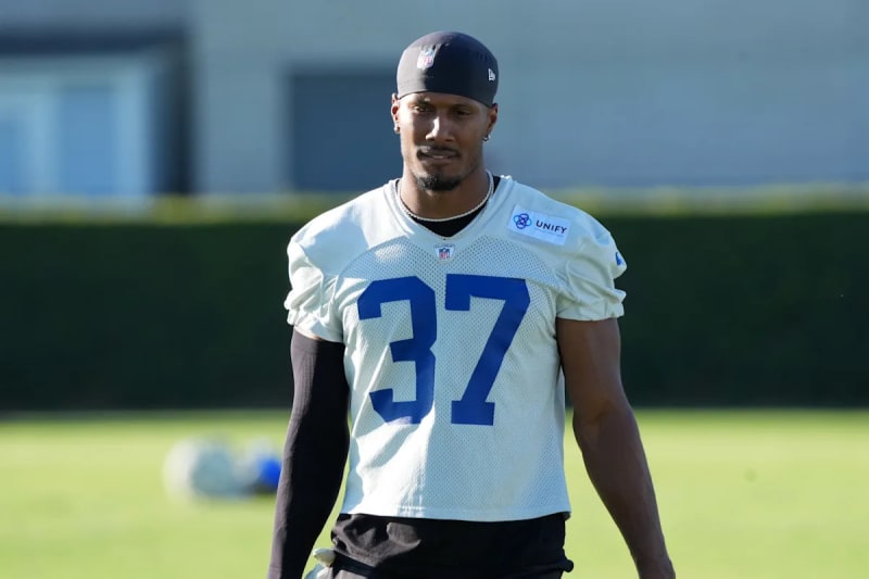 Rams' Rising Star Quentin Lake Signs Extension, Primed for Playoff Return