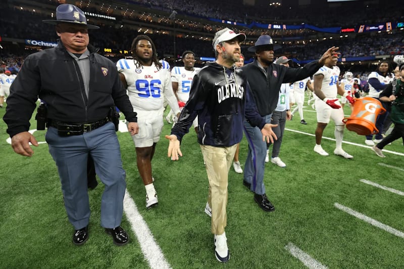 College Football Playoff Drama: Ole Miss Survives Insane 9-Lateral Final Play Against Georgia