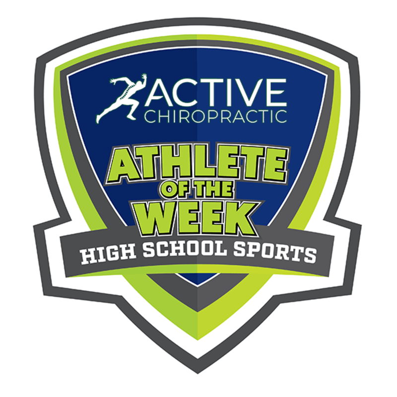 High school basketball player Kaeden Garcia celebrating on court after overtime victory game