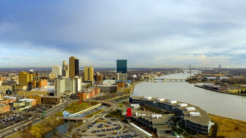 Aerial view of Toledo, Ohio skyline showing downtown buildings and urban development along waterfront