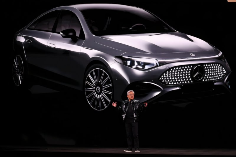 Modern self-driving electric car with visible sensors and cameras navigating city street with AI technology overlay