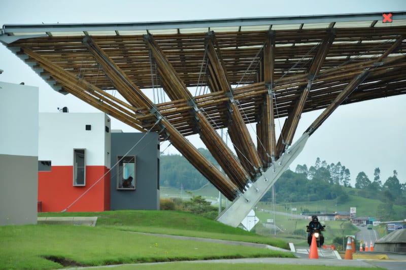 Modern bamboo toll booth structure in Colombia demonstrating structural bamboo engineering techniques
