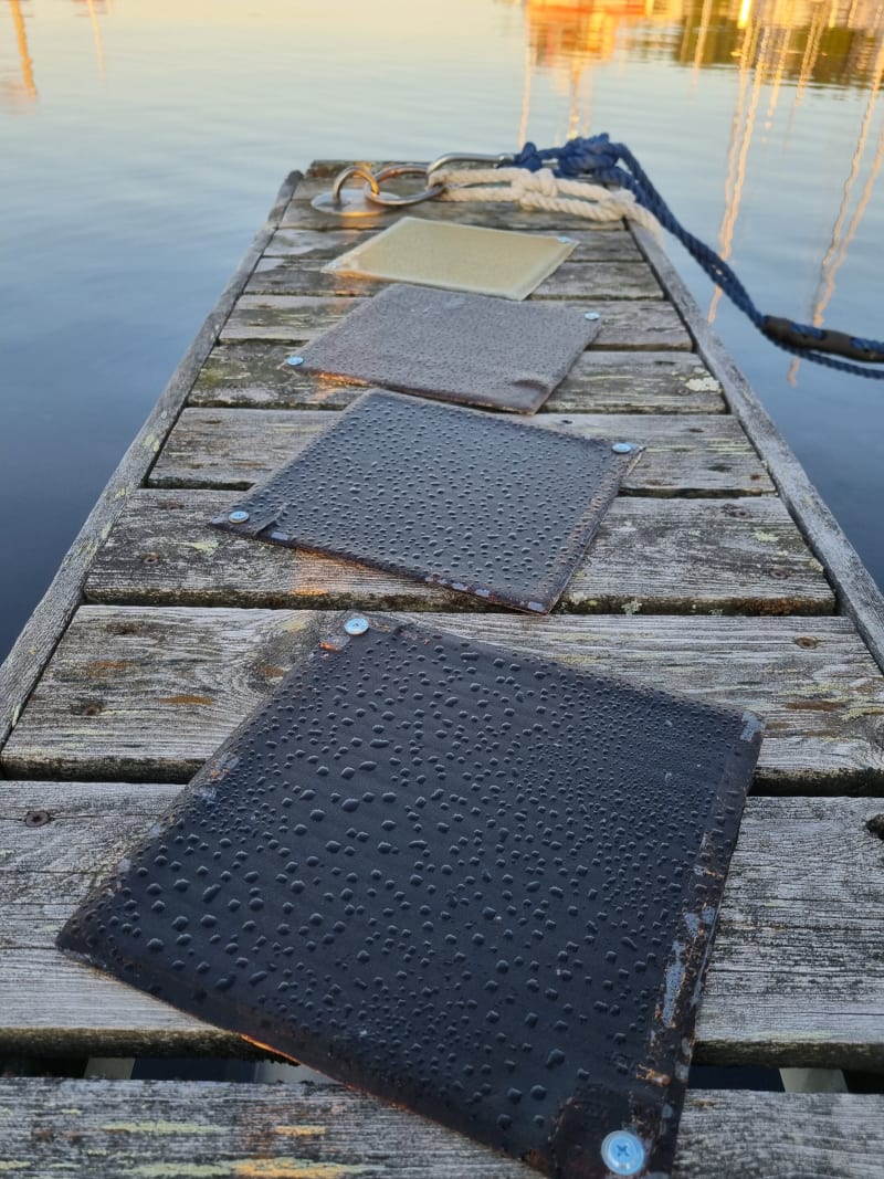 Composite panels made from forest-based bio-resins being tested outdoors in harbor conditions