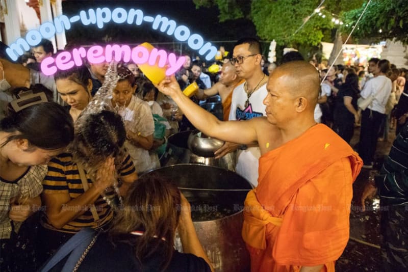 Thousands of devotees gathered under full moon at historic Thai Buddhist temple ceremony
