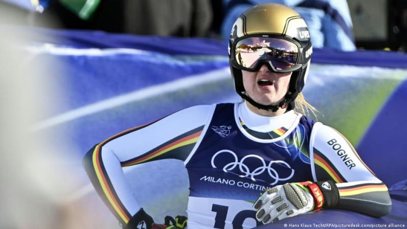 German skier Emma Aicher competing in downhill race at 2026 Winter Olympics in Italy