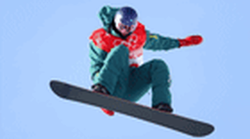 Australian skier Cooper Woods airborne during his gold medal winning moguls run at Milano Cortina Olympics