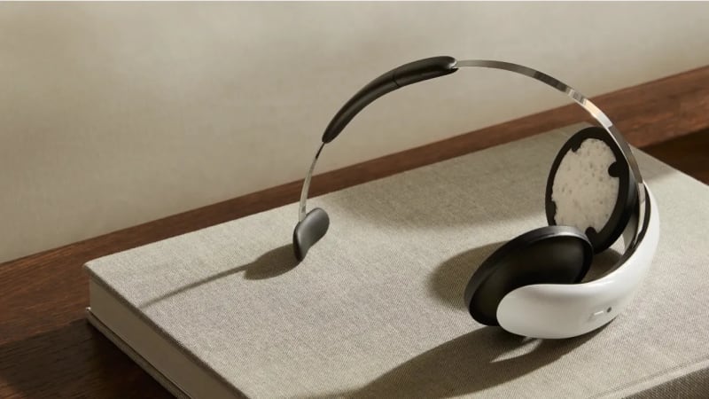 Woman wearing lightweight headset device that delivers electrical brain stimulation for depression treatment at home