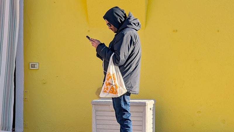 Android smartphone displaying security shield icon representing Google's protection against malicious proxy networks