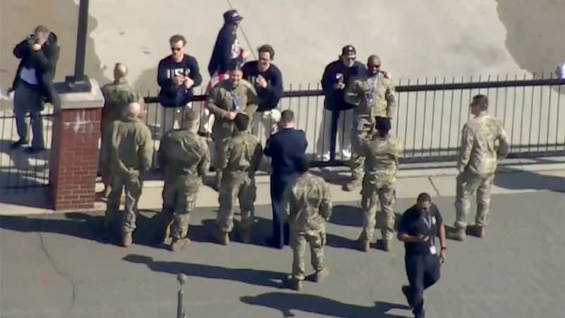 Team USA Hockey Players Share Gold Medals with Troops