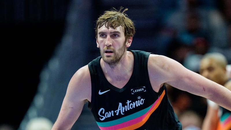 Luke Kornet of the San Antonio Spurs playing basketball during an NBA game