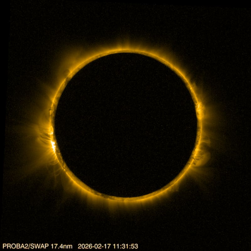 Annular solar eclipse showing moon creating glowing ring around sun from satellite view