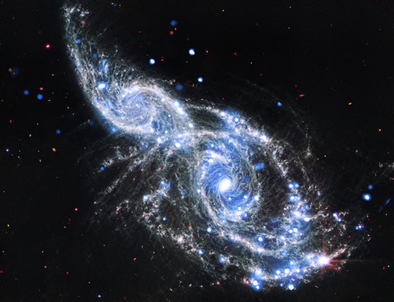 Cosmic Collision: NASA Telescopes Unveil Spectacular Galactic Merger