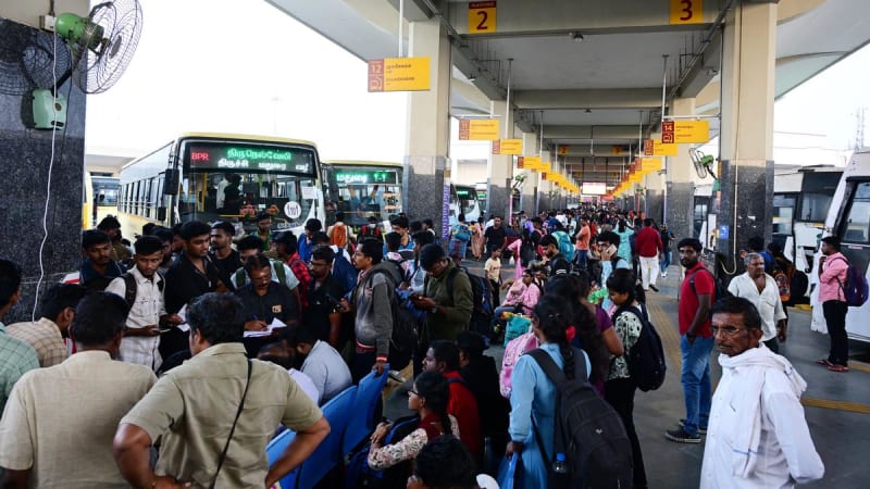 Colorful Tamil Nadu state transport buses lined up at modern bus terminus ready for Pongal festival travelers