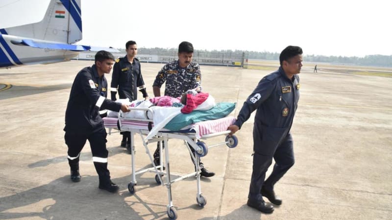 Indian Coast Guard Dornier aircraft on tarmac, converted into mobile intensive care unit for island medical evacuation