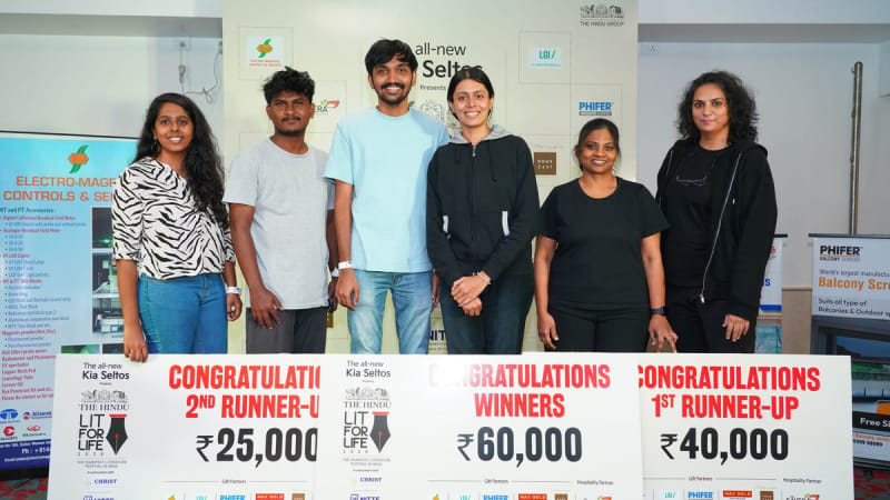 Teams of literary enthusiasts gather at treasure hunt starting point in Chennai with maps and clue sheets