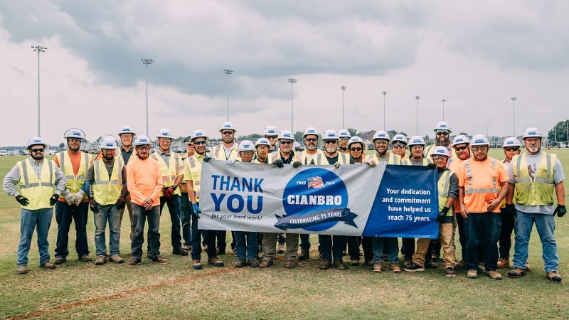 ** Wind turbines standing tall at former military radar base in rural Maine landscape