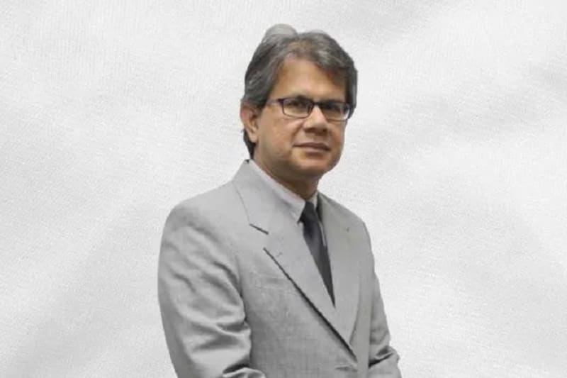 Modern industrial battery recycling facility with workers processing electric vehicle batteries in Malaysia