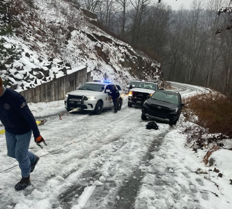 Firefighters Save Driver Hanging Off Icy Mountain Road - Image 3