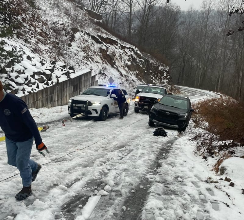 Firefighters Save Driver Hanging Off Icy Mountain Road