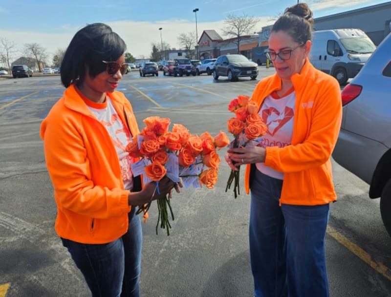 St. Charles Volunteers Give 170 Roses to Strangers - Image 2