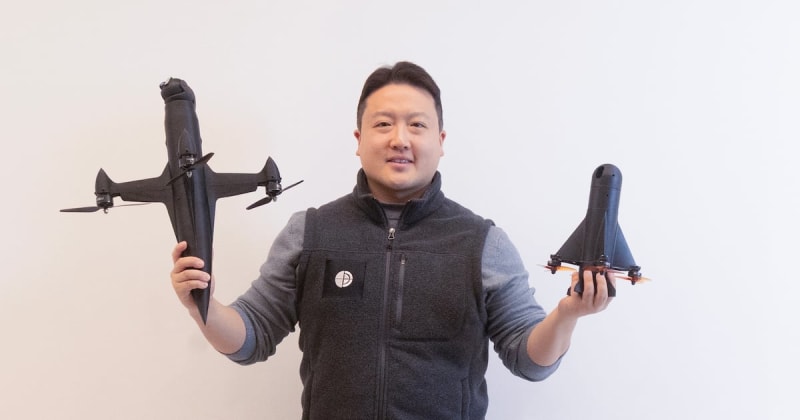 CEO Lee Do-kyung holding innovative multi-drone system at BONE headquarters in Seoul
