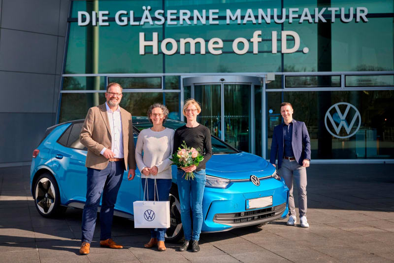 Silver Volkswagen ID.3 electric vehicle at delivery center in Dresden Germany celebrating milestone