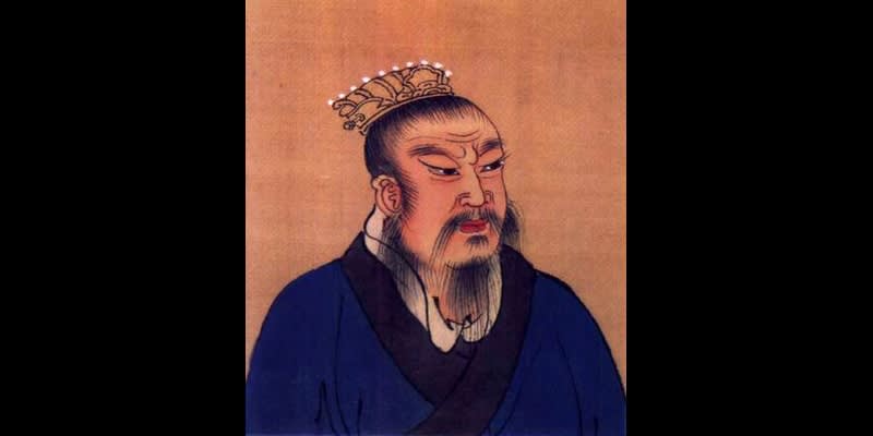 Black and white photograph of chemist Wallace Carothers working in laboratory with scientific equipment