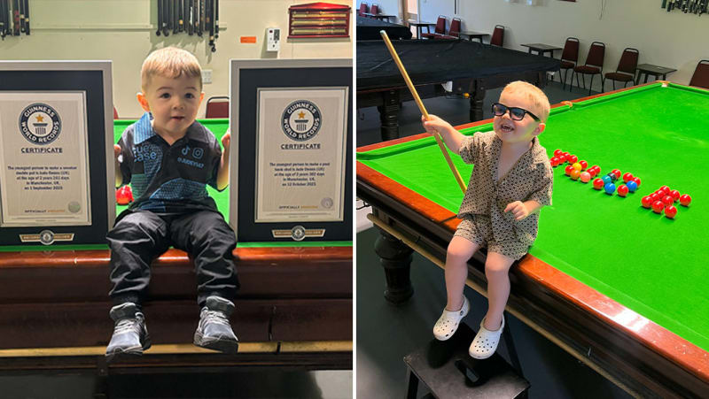 Two-year-old Jude Owens standing on stool playing snooker on regulation table
