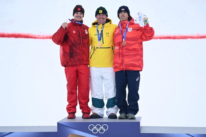 Australian Cooper Woods Wins Olympic Moguls Gold in Italy