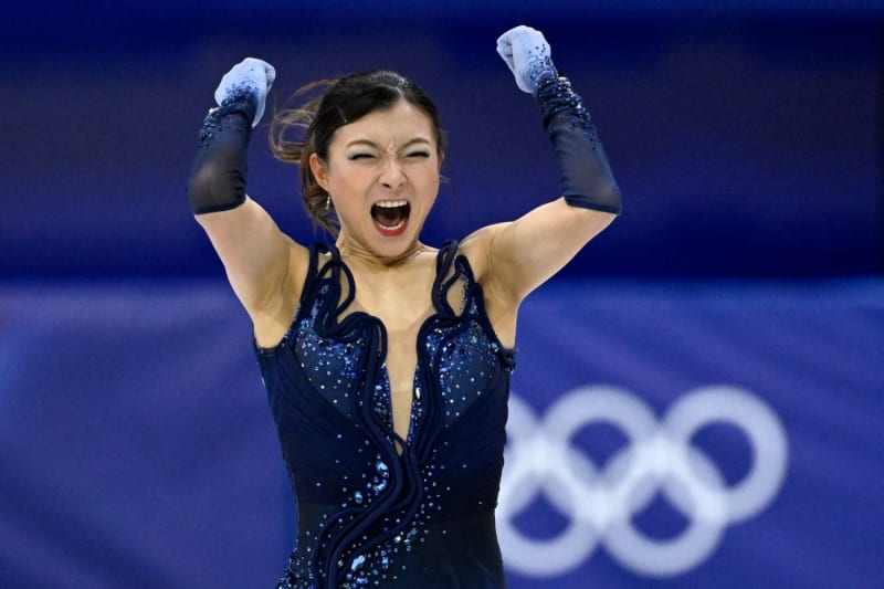 Japanese figure skater Ami Nakai performing her short program routine at Milano Ice Skating Arena