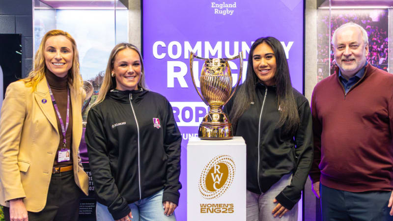 Women's Rugby World Cup trophy displayed at Loughborough University with students and officials