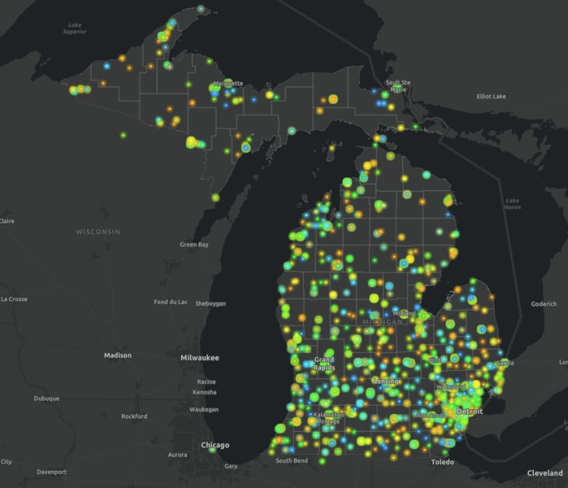 Interactive digital map of Michigan showing environmental grant and loan distribution across communities