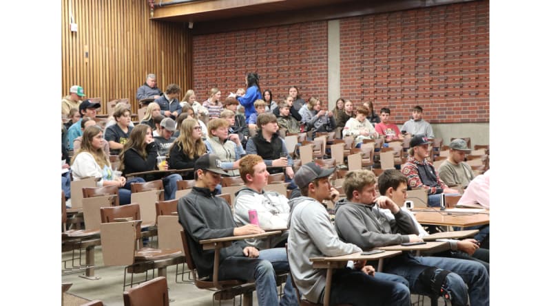 Nebraska university campus building with students walking between agricultural science facilities