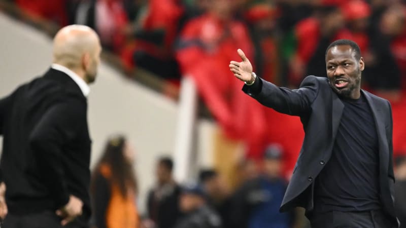 Senegalese football players celebrating their 2025 African Cup of Nations championship victory