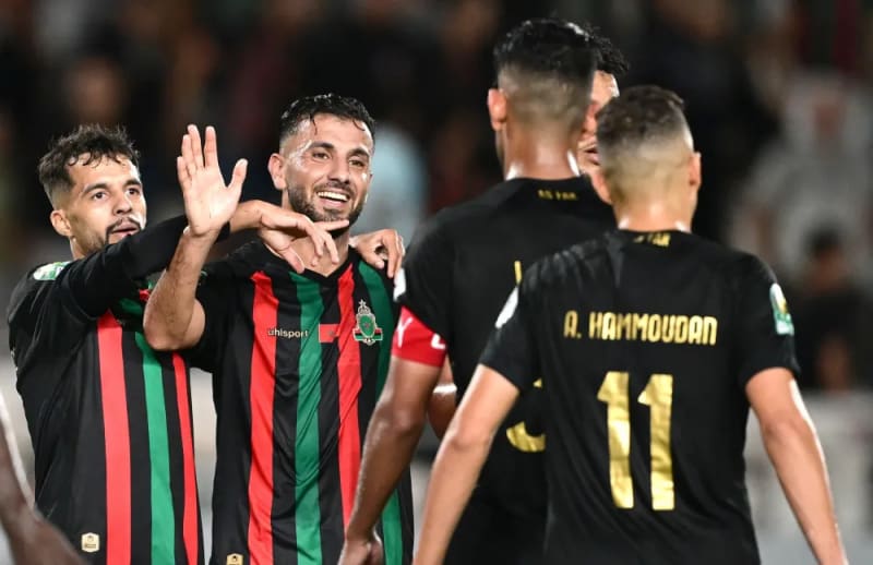 AS FAR Rabat soccer players celebrating goal during CAF Champions League match in Rabat