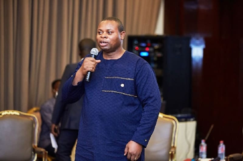 Franklin Cudjoe, IMANI Africa founder, smiling confidently while advocating for Parkinson's disease awareness and support