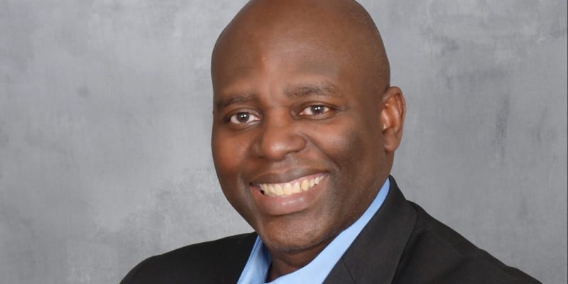 Ghanaian citizens participating in democratic electoral process, voting at polling station with hope and engagement