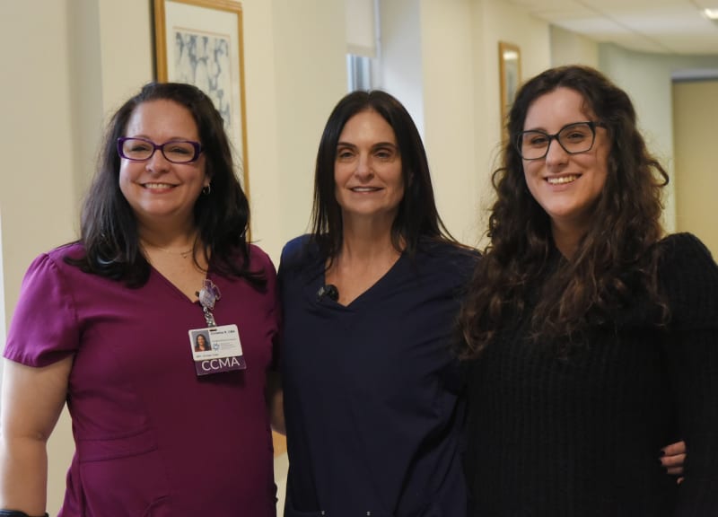 Madison Kennedy reunites with NICU nurse Janine Buggle in hospital hallway 21 years later