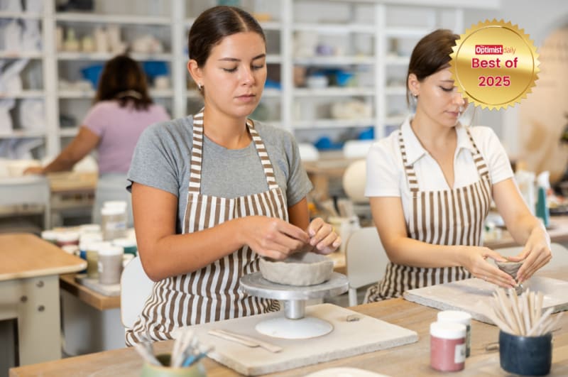 Hands engaged in creative crafting activity with colorful materials promoting mental wellness and mindfulness