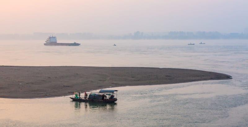 Aerial view of the Yangtze River winding through green landscape showing ecological recovery