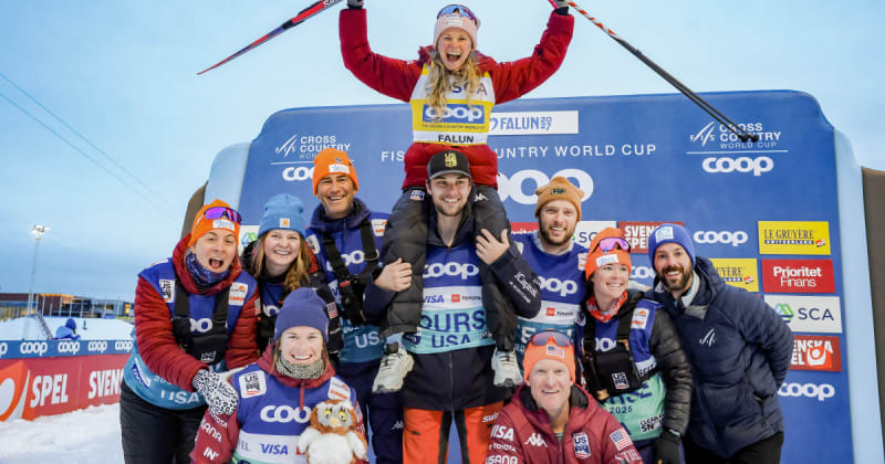 Jessie Diggins celebrates on podium with team after second place finish in Sweden World Cup