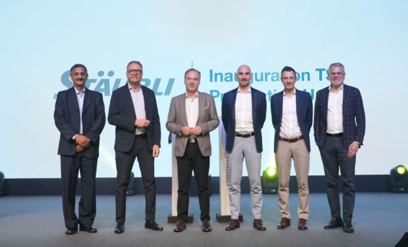 Automated assembly line manufacturing small electrical connectors for solar panels in modern Indian factory