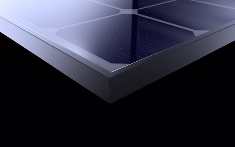 Close-up of lightweight glass fiber composite solar panel frame in manufacturing facility