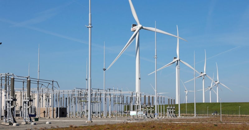 Offshore wind turbines standing tall at de Maasvlakte port in Rotterdam, Netherlands