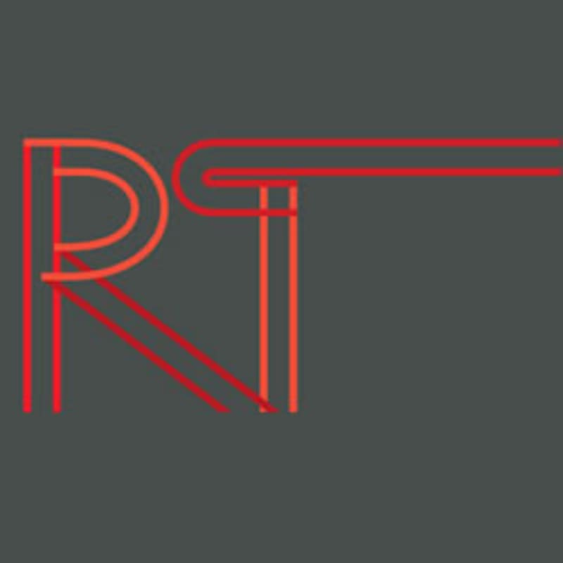 Modern robotics workspace in New York City with collaborative teams working on innovative technology